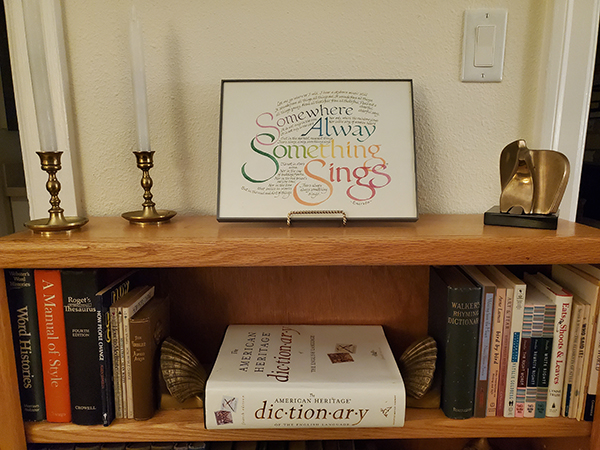 Framed artwork of Emerson's poem Music.  Calligraphy by Margaret Keip